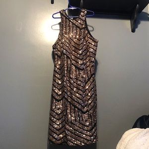 Gold and black sparkly homecoming dress